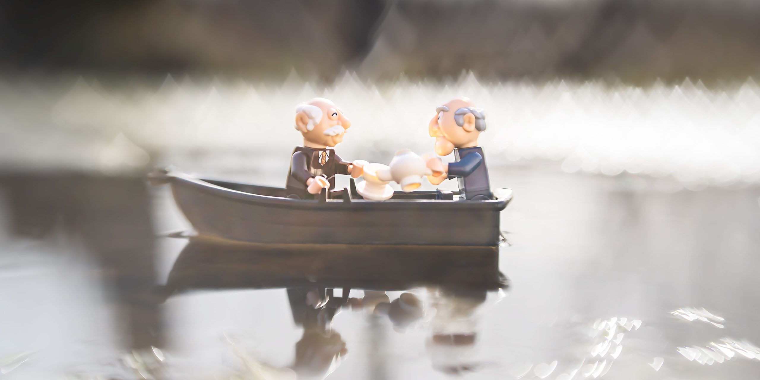Statler-&-Waldorf-in-boat-verticle-crop